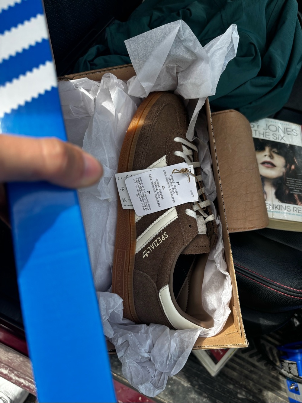 adidas woman’s Spezial Suede Sneaker in Brown and White earth strata
